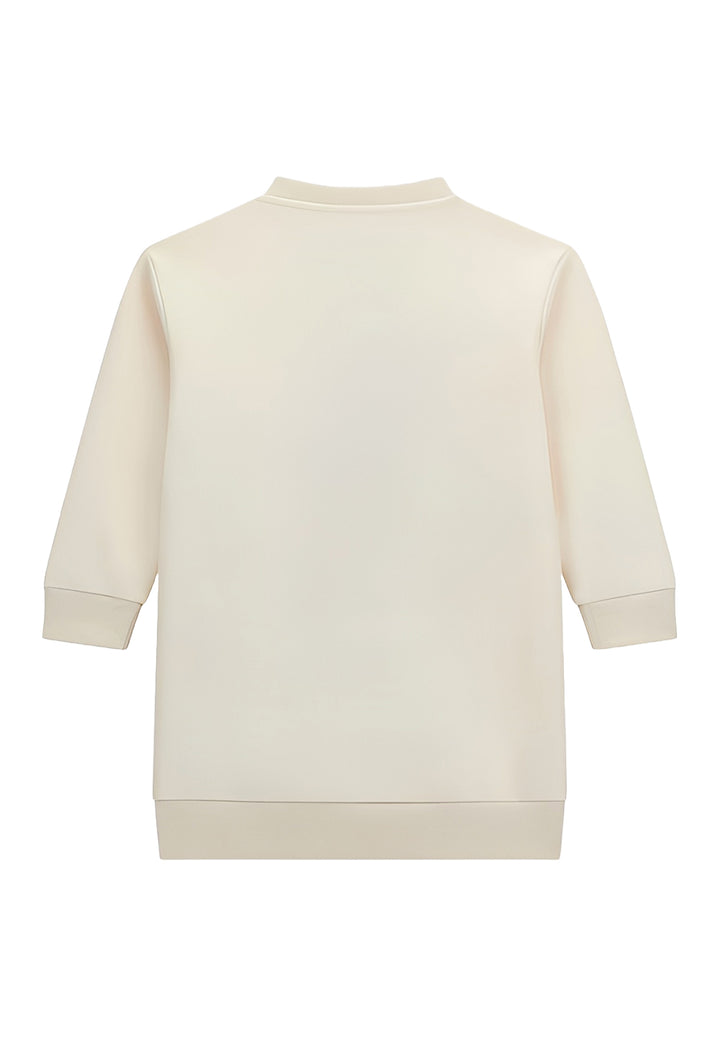 Cream-colored dress for a little girl